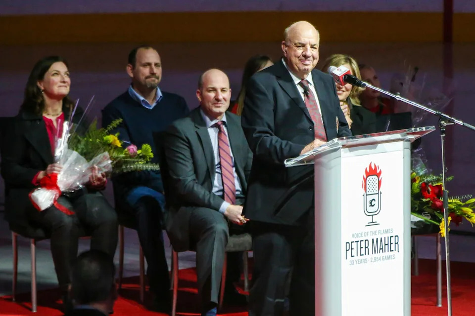 Nov 18, 2014; Calgary, Alberta, CAN; Legendary broadcaster Peter Maher is honored before the game between the Calgary Flames and the Anaheim Ducks at Scotiabank Saddledome. © Sergei Belski-Imagn Images