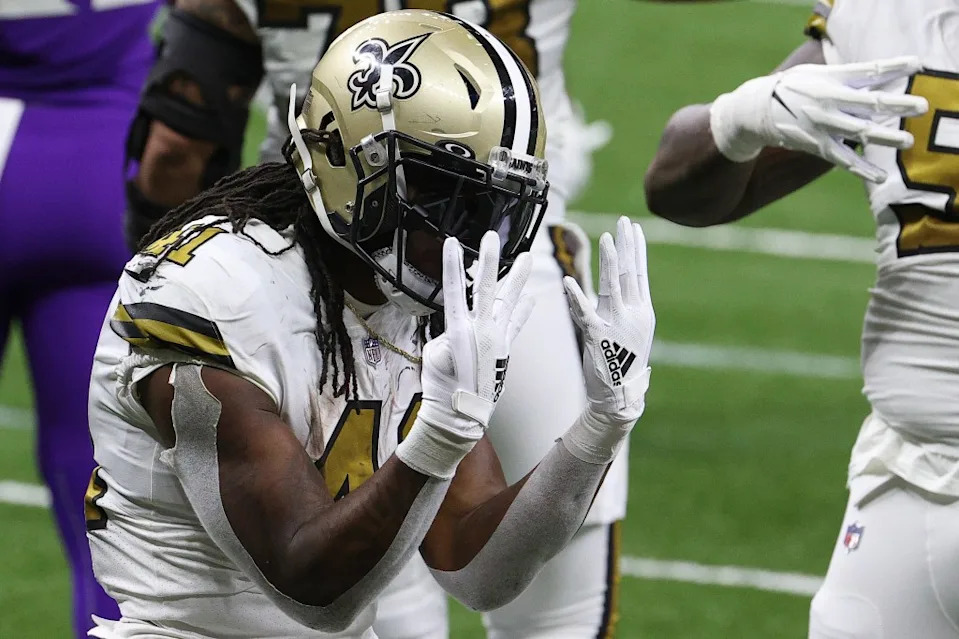 Alvin Kamara of the New Orleans Saints celebrates scoring his fourth touchdown of the game during the third quarter against the <a class="link " href="https://sports.yahoo.com/nfl/teams/minnesota/" data-i13n="sec:content-canvas;subsec:anchor_text;elm:context_link" data-ylk="slk:Minnesota Vikings;sec:content-canvas;subsec:anchor_text;elm:context_link;itc:0" data-yga="{"yLinkElement":"context_link","yModuleName":"content-canvas","yLinkText":"Minnesota Vikings","ySubModuleName":"anchor_text","yHasCommerce":false}">Minnesota Vikings</a>. Getty Images