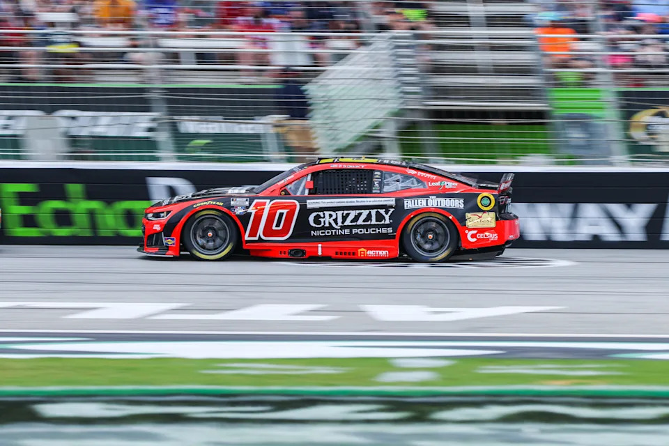 Jul 12, 2026; Hampton, Georgia, USA; Grizzly Nicotine Pouches driver Ty Dillon (10) races during the Quaker State 400 at EchoPark Speedway. Mandatory Credit: Jordan Godfree-Imagn Images