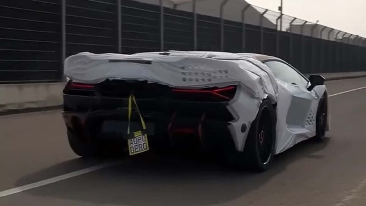 Lamborghini Revuelto SV Spied With License Plate Dangling From The Rear Lamborghini Revuelto SV Spied With License Plate Dangling From The Rear