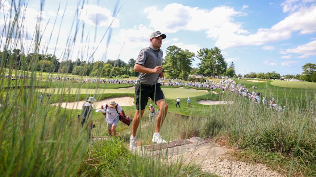 With dad on bag, England’s Jack Whaley plays on at Merion