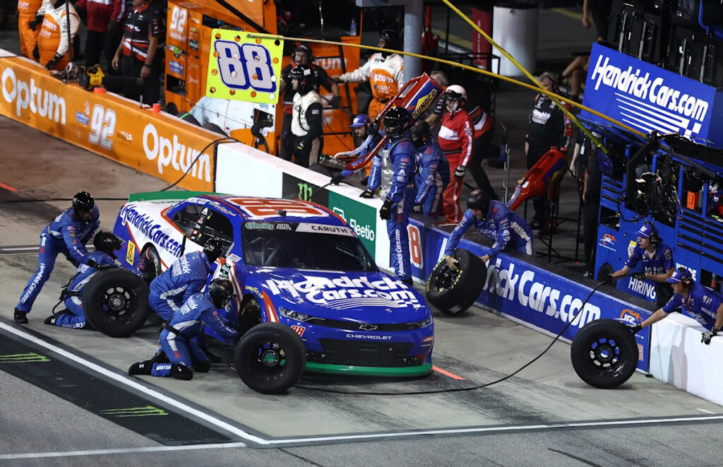 NASCAR O’Reilly Series race red-flagged after pit road crash that comes dangerously close to pit crew