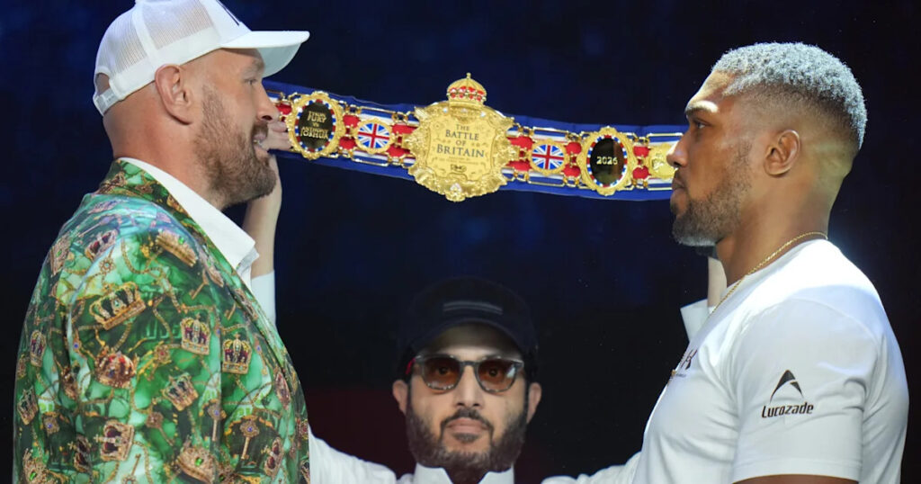 Fury and Joshua are mostly smiles as they take stage together ahead of Cardiff bout