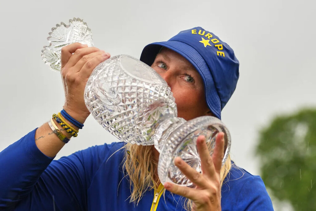 Europe beats US 15-13 in Solheim Cup. Lowry takes Irish Open by record 11 shots