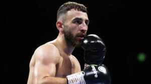 Collins stopped by Davies in seventh round Collins stopped by Davies in seventh round