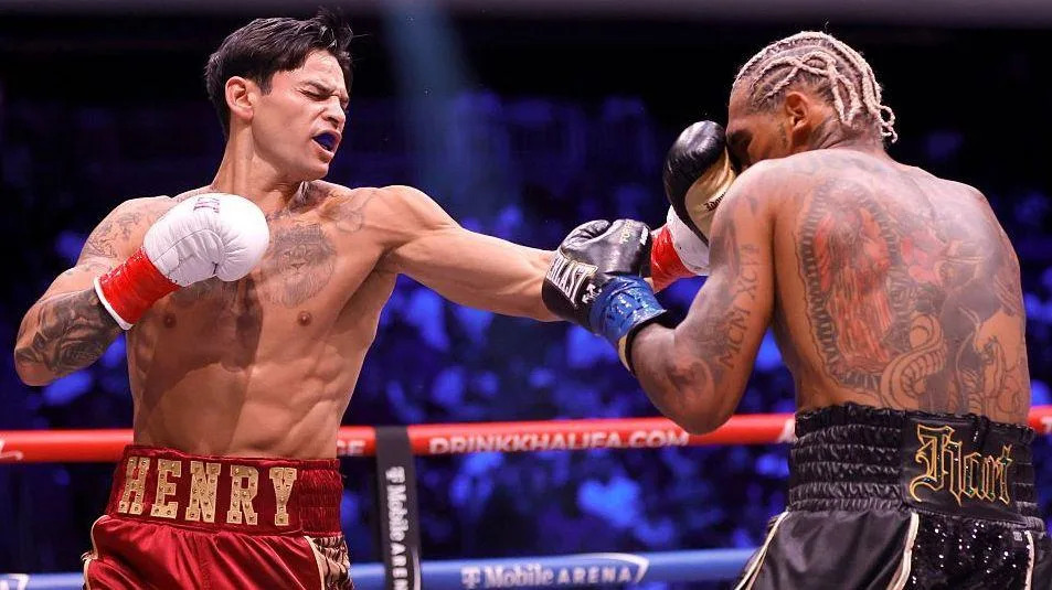 Garcia crushes overmatched Benn in two rounds Garcia crushes overmatched Benn in two rounds