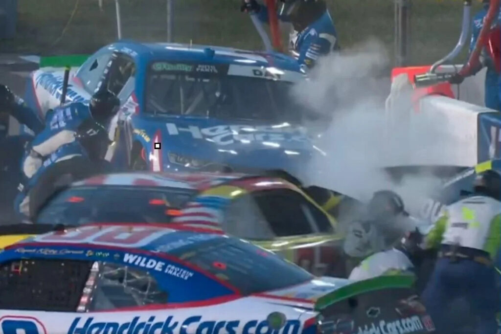 Pit crews narrowly avoid serious injury, pit road completely blocked in scary NASCAR crash