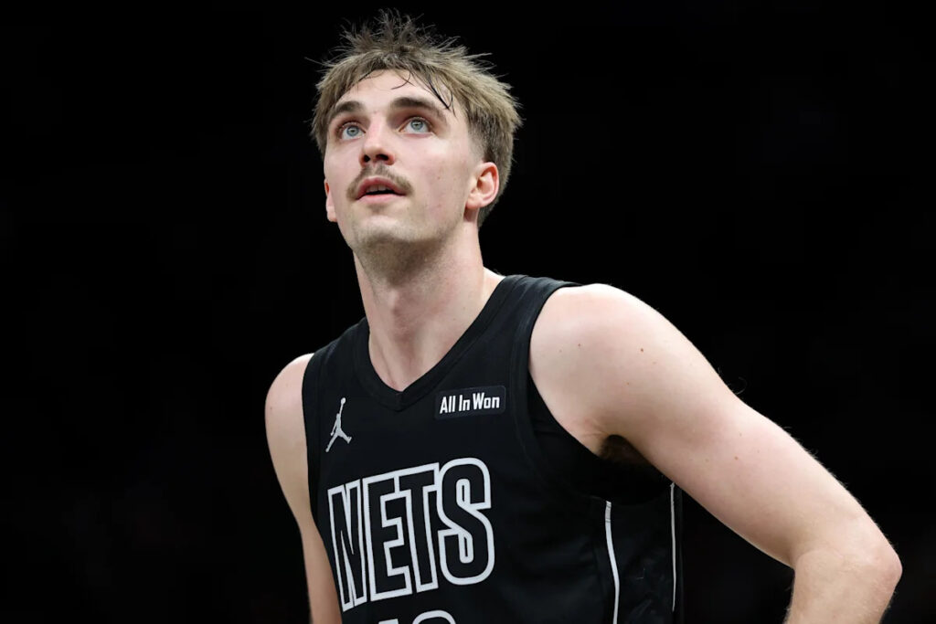Nets bring back 7-footer Grant Nelson on two-way deal