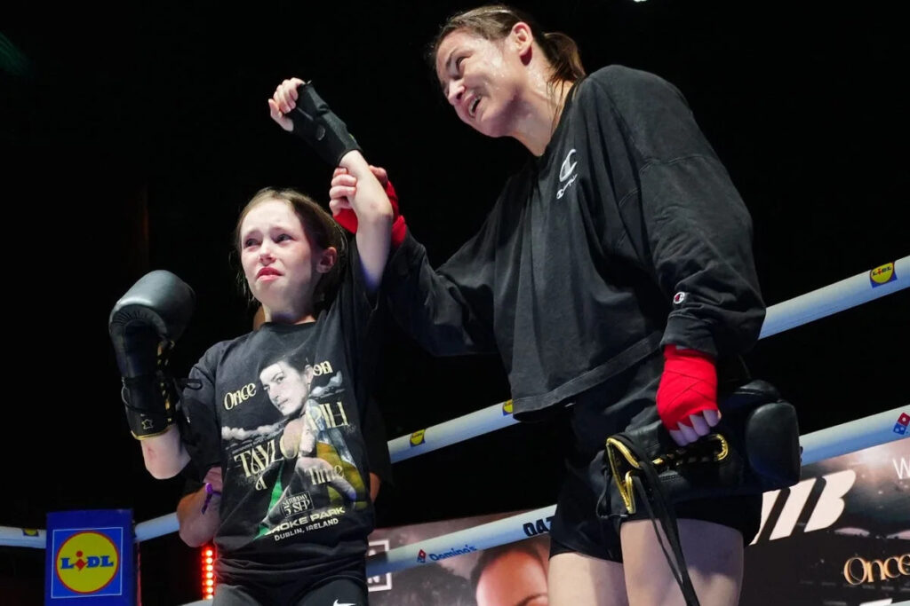 Katie Taylor has young fan in tears as she gives boxing lesson before final fight