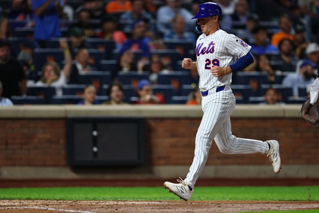 Jared Young injury update: Mets first baseman carted off after scary collision Jared Young injury update: Mets first baseman carted off after scary collision