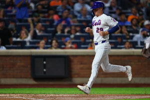 Jared Young injury update: Mets first baseman carted off after scary collision Jared Young injury update: Mets first baseman carted off after scary collision