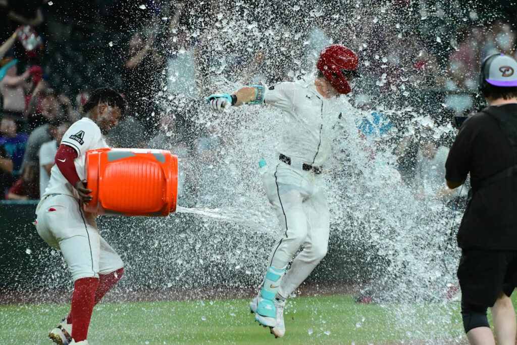 Diamondbacks keep playoff hopes alive with another ninth-inning comeback win